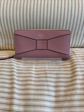 Kate Spade Neda Bridge Place Wallet Rosefrost color with bow design